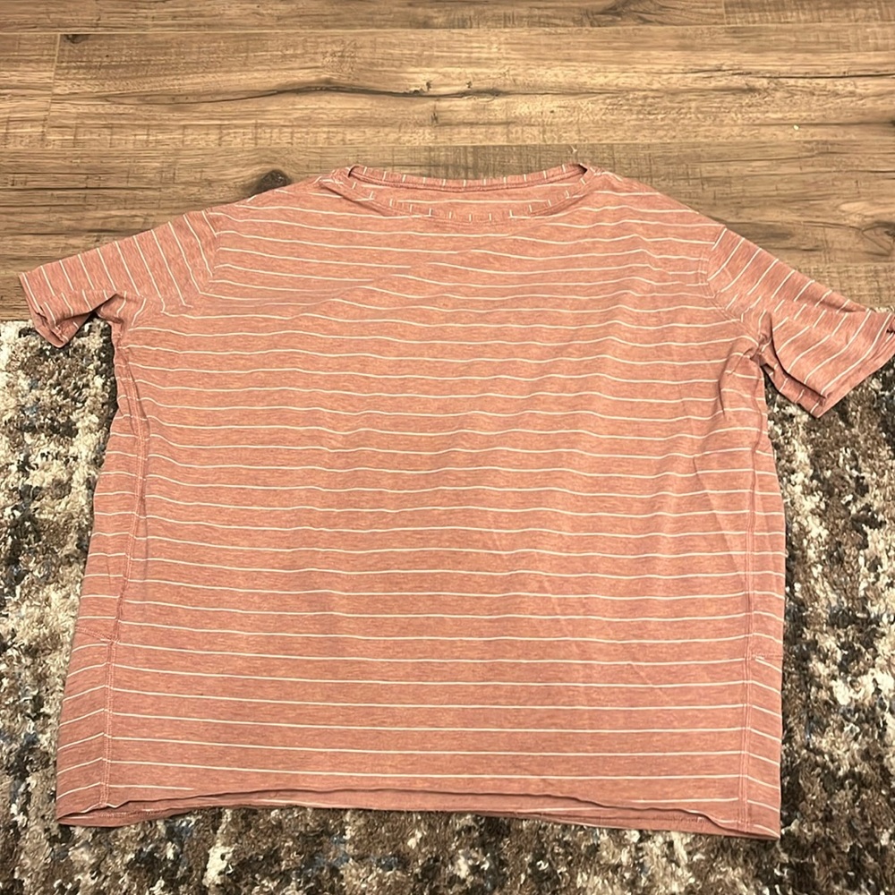 Size 12 Lulu lemon stretchy baggy workout top. No tags